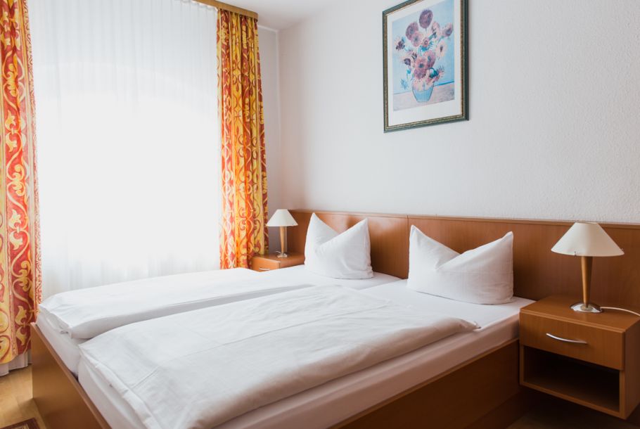 Hotel Wernigerode - Altwernigeröder Apparthotel Bild Betten